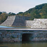 Hagi Casle: traditional defensive stone walls and bridged moat against the backdrop of Mt. Shizuki. The castle tower was located on foundations.