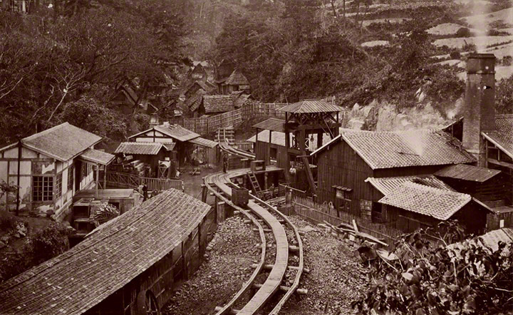 Hokkei Pit, operational 1869-1876. A manual tramway linked the shaft to a pier from where fleets of between 60 and 100 barges, toward by the Mine's steam tug, transferred the coal 15 km to Nagasaki.