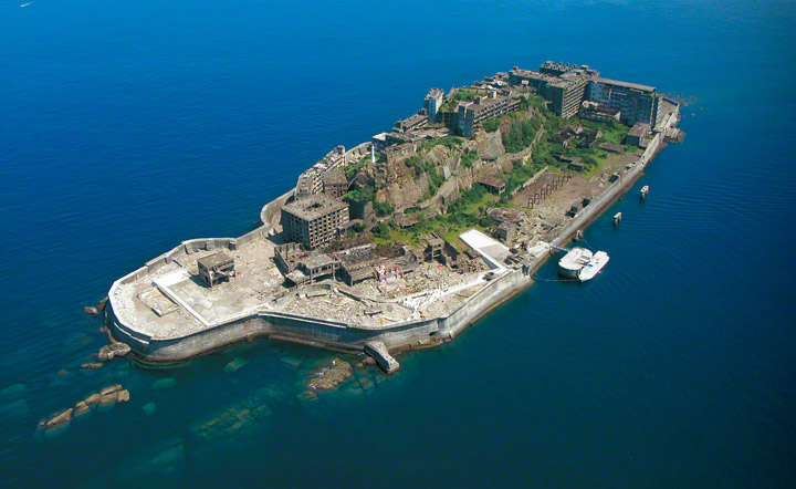Aerial view of Hashima showing the perimeter sea wall and the south and east sectors of the island that were developed to primary mining facilities.