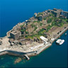 Aerial view of Hashima showing the perimeter sea wall and the south and east sectors of the island that were developed to primary mining facilities.