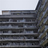 No. 65 company residence building for miners. It was nine-storied (partially ten-storied) and the biggest company residence in Hashima. It had U-shaped structure and there was a children's park in the courtyard and a kindergarten on the roof top.