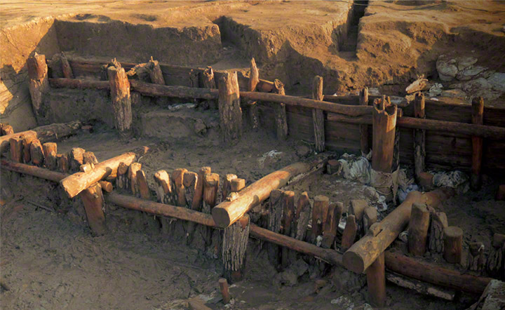 Mietsu Naval dock, the oldest surviving dock in Japan, built by 1861 and excavated in 2009-2012. Perfectly preserved wooden pilings delineate a frontage restrained by lateral poles, the whole being anchored back to an inner wall section.